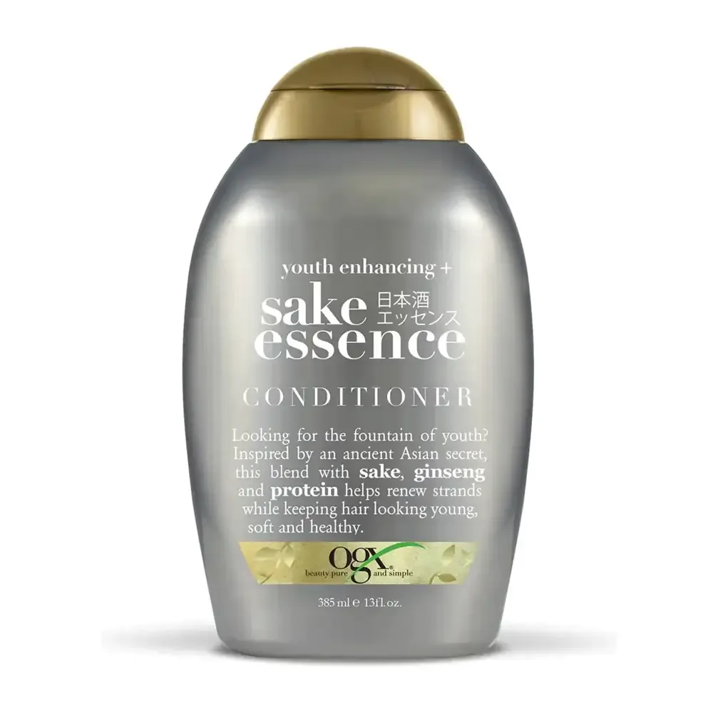 Acondicionador ogx de 385ml con esencia de sake para el cuidado capilar