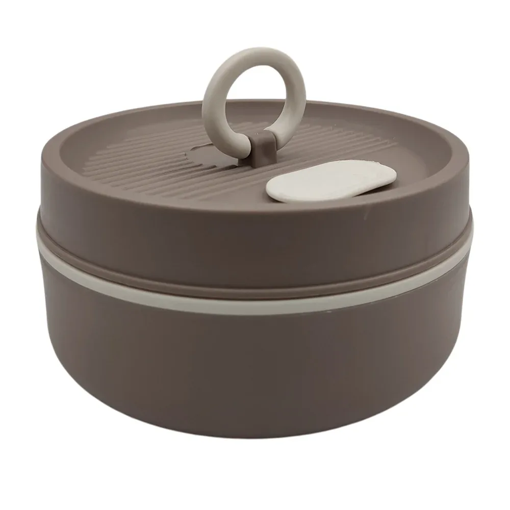 Tupper pequeño, redondo, con interior metálico y anillo agarradera, usos varios