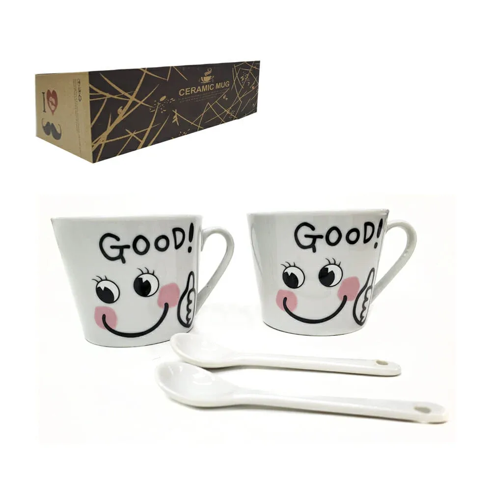 Caja con 2 tazas de cerámica good! diseño de emoji carita y 2 cucharas / 19236618513