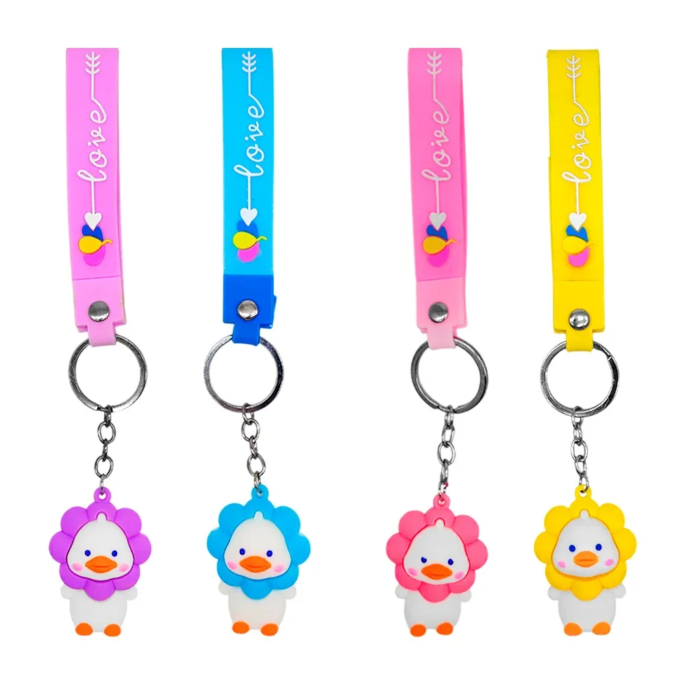 1pza Llavero en forma de pato con flor en la cabeza + banda con frase loive, variedad de colores
